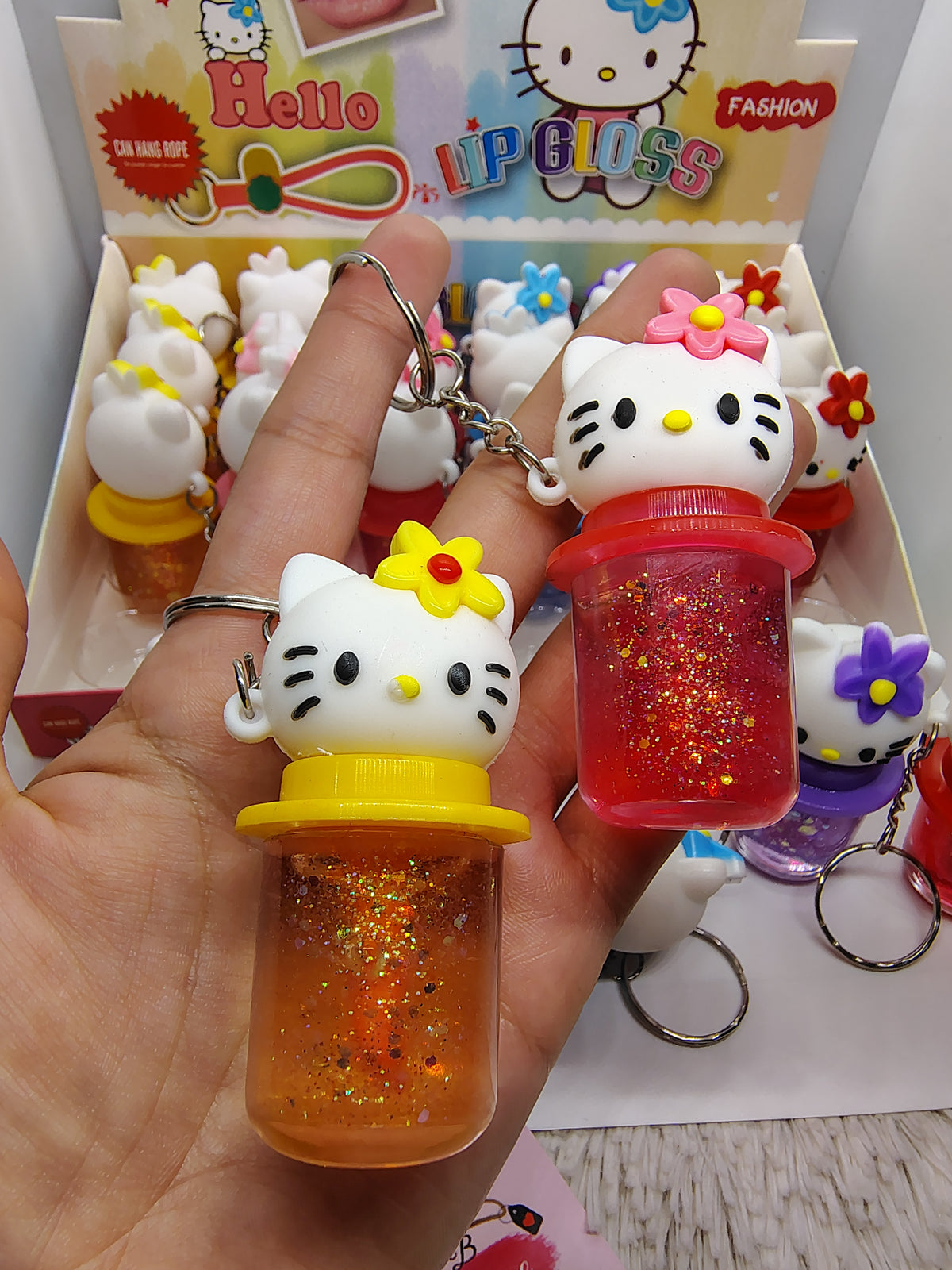Gloss con color de Hello Kitty con llavero 💖✨